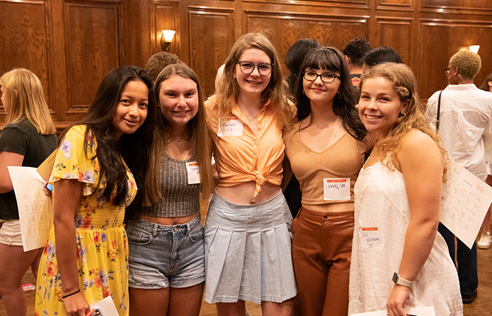 Students pose for a photo during their icebreaker activity.